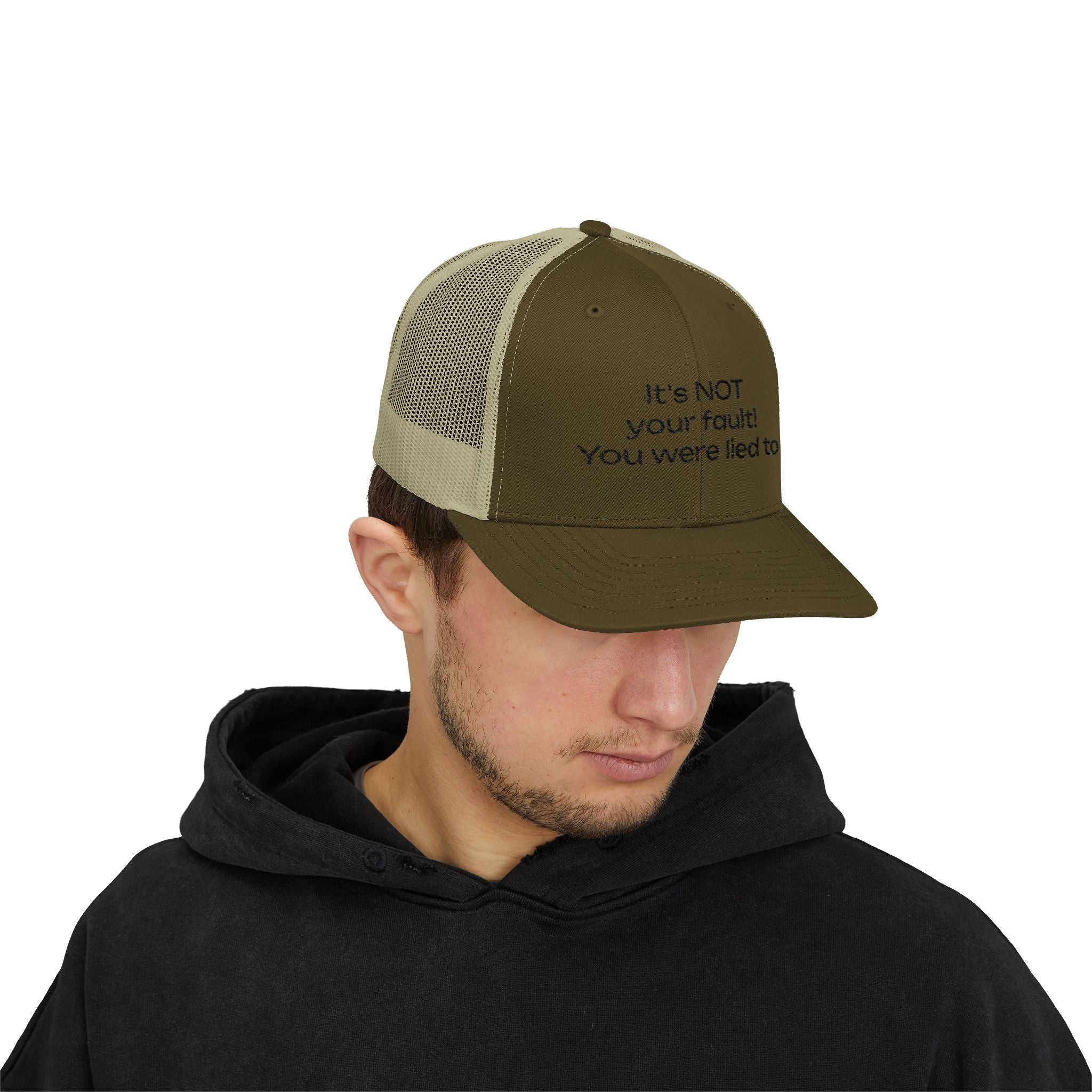 It's NOT Your Fault Trucker Cap — White Mesh Snapback with Reassuring Text