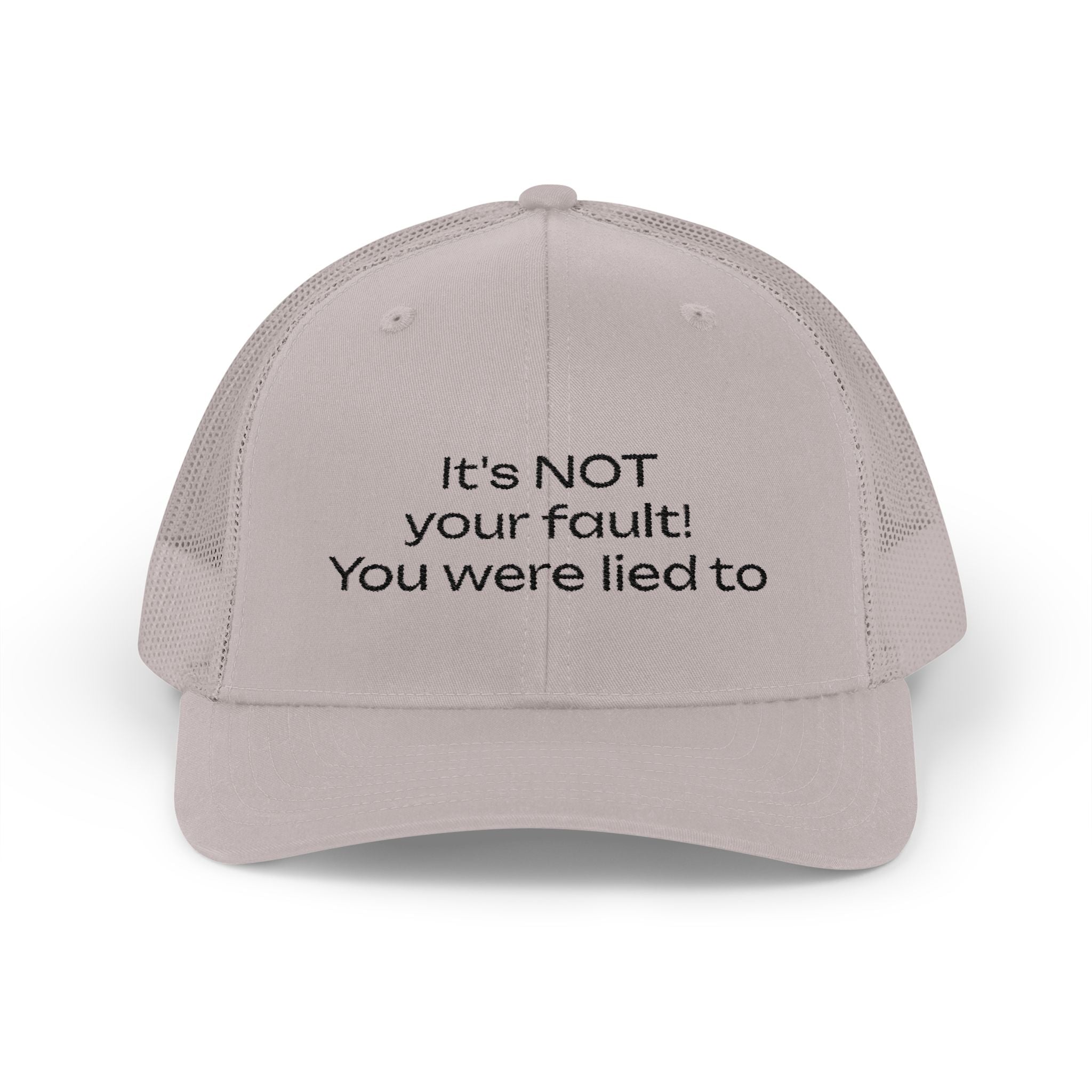 It's NOT Your Fault Trucker Cap — White Mesh Snapback with Reassuring Text