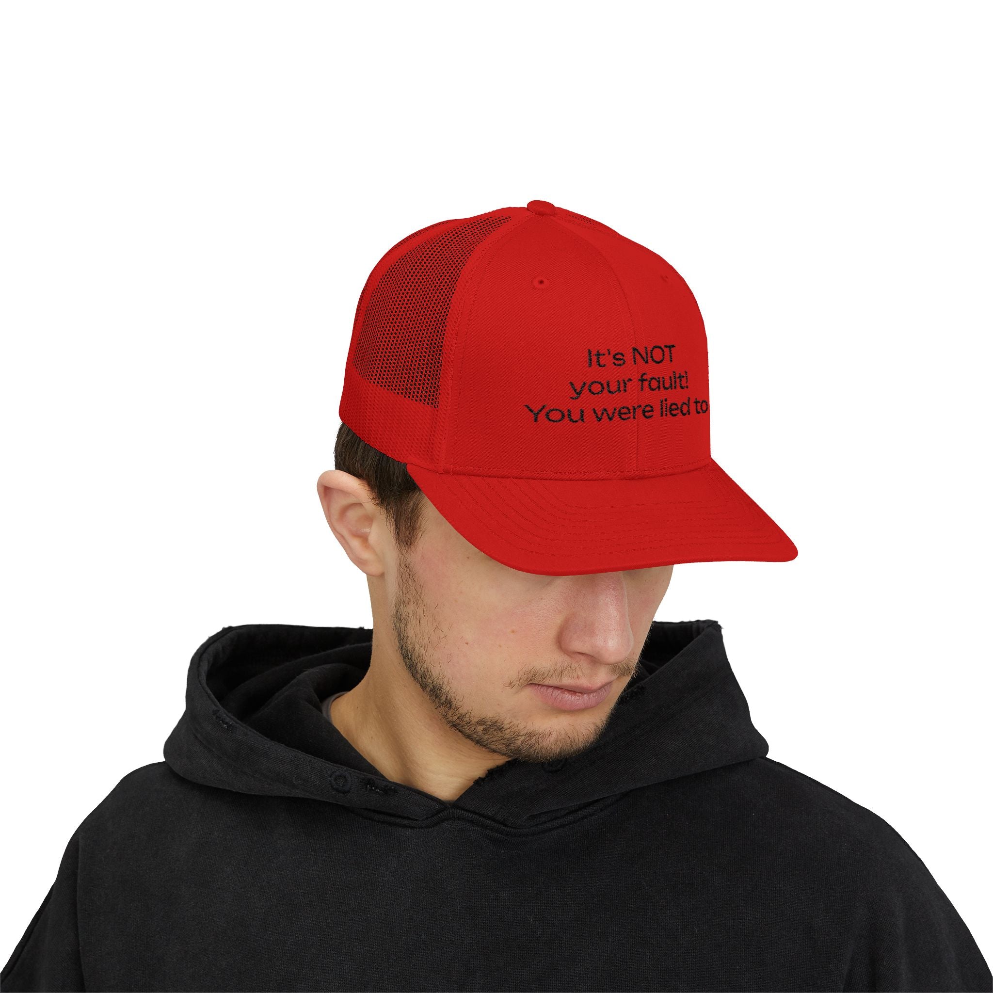 It's NOT Your Fault Trucker Cap — White Mesh Snapback with Reassuring Text