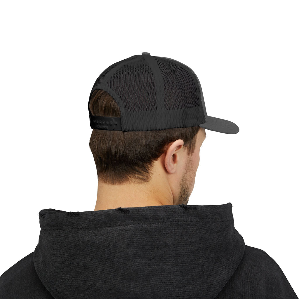It's NOT Your Fault Trucker Cap — White Mesh Snapback with Reassuring Text