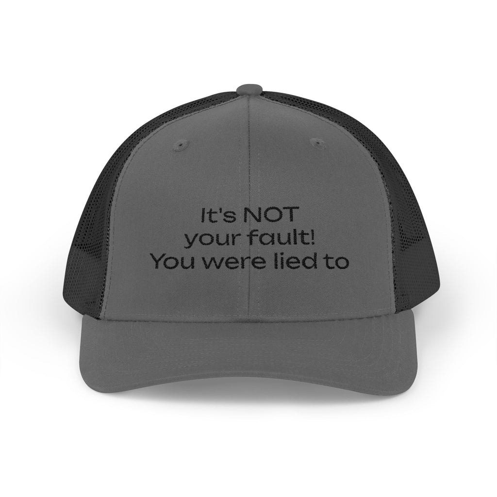 It's NOT Your Fault Trucker Cap — White Mesh Snapback with Reassuring Text