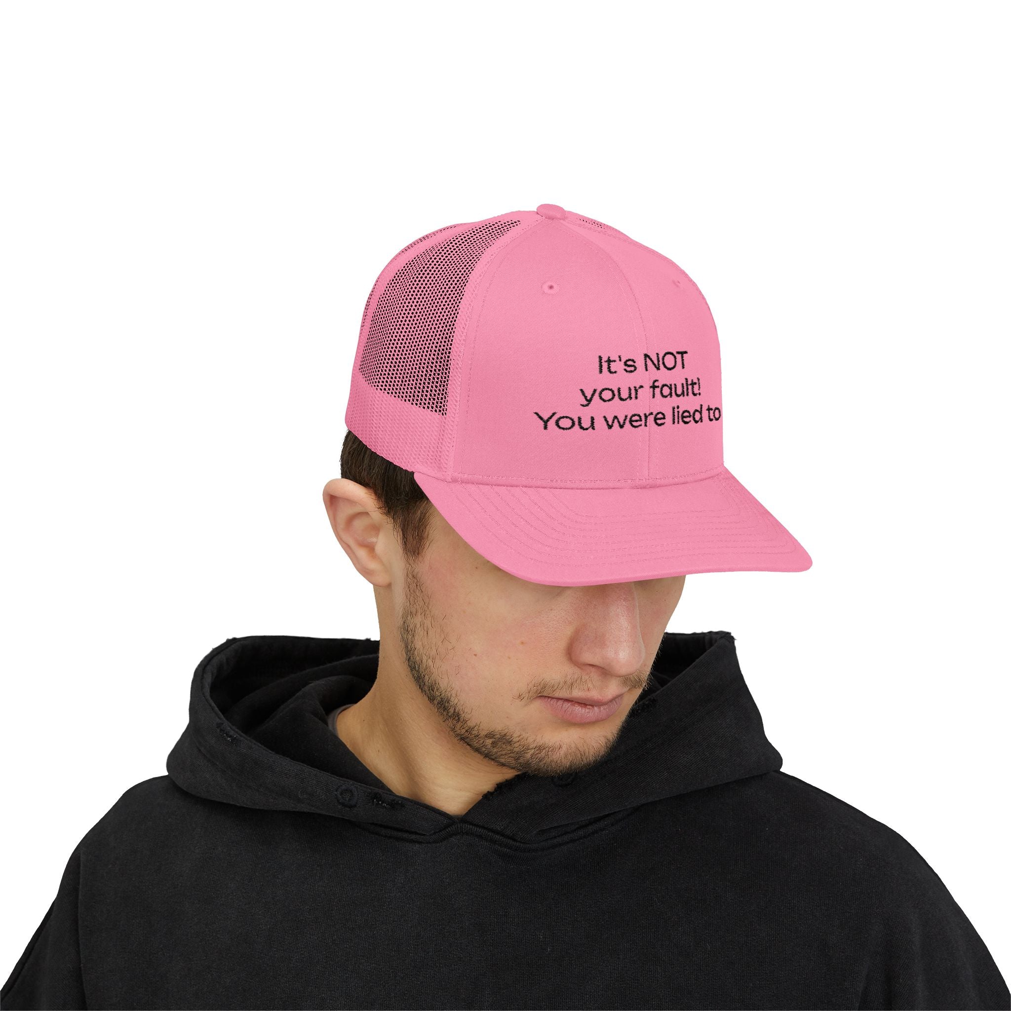 It's NOT Your Fault Trucker Cap — White Mesh Snapback with Reassuring Text