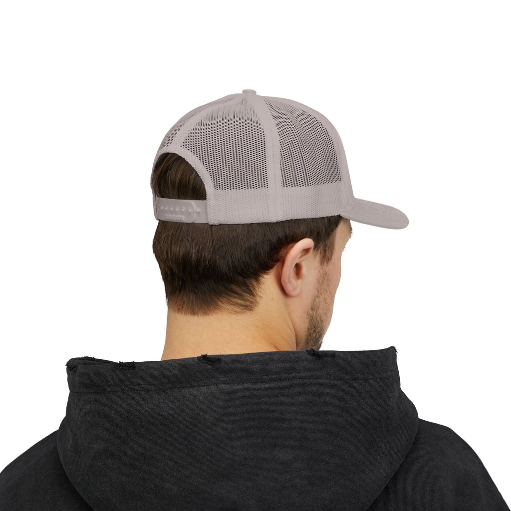 It's NOT Your Fault Trucker Cap — White Mesh Snapback with Reassuring Text