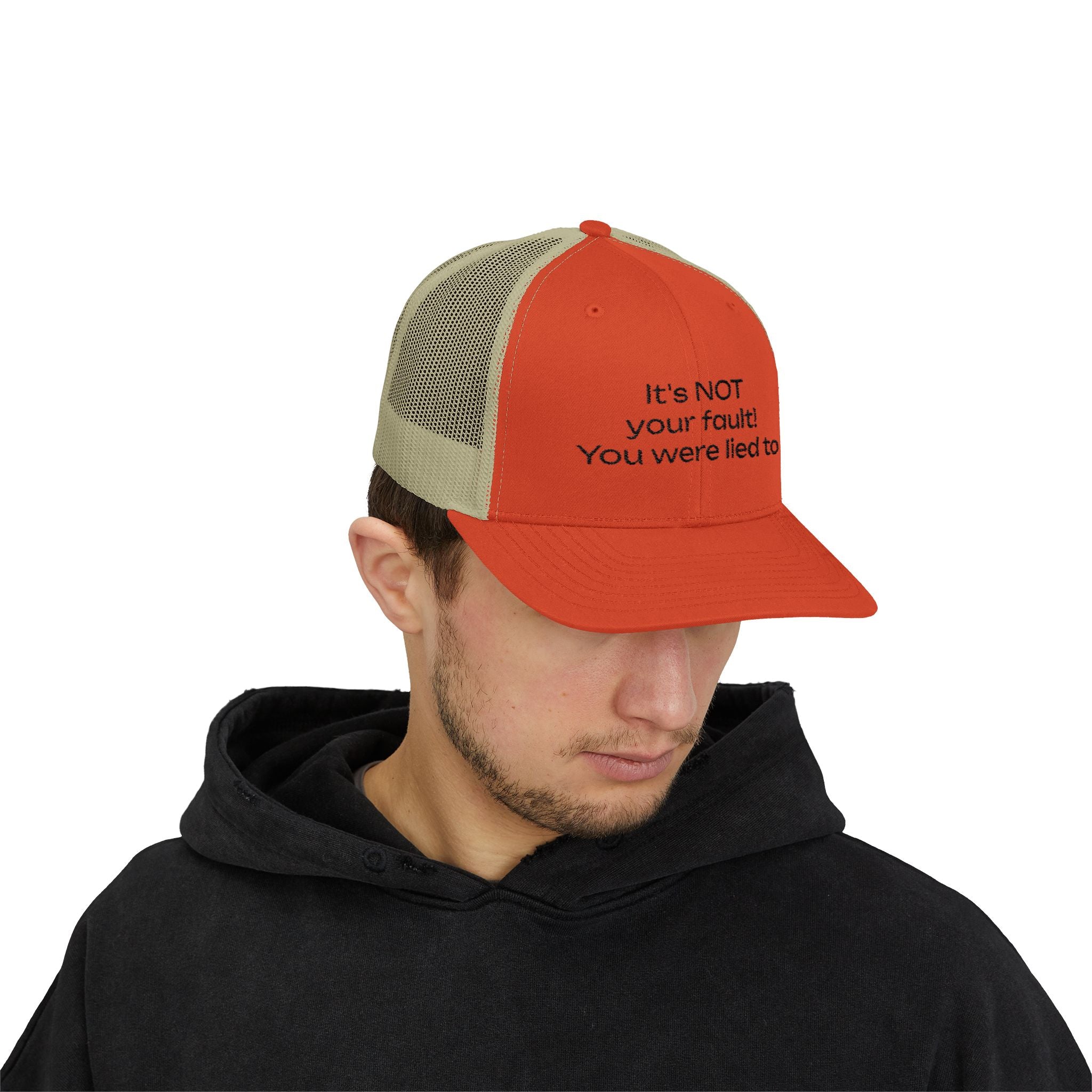 It's NOT Your Fault Trucker Cap — White Mesh Snapback with Reassuring Text